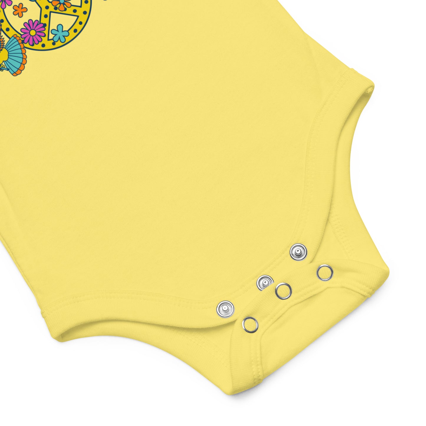 Close-up of the three-snap leg closure on a baby onesie.