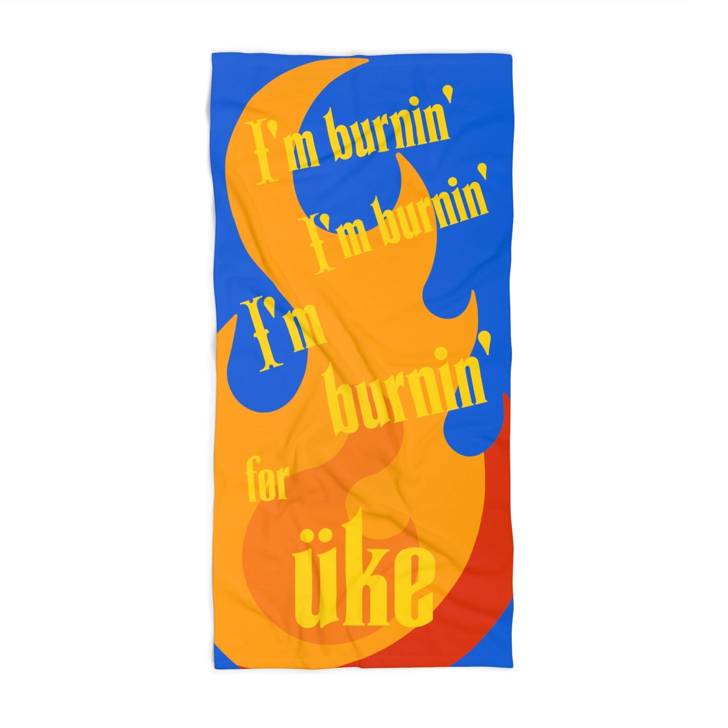 Beach towel printed with a flame background and the text 'I'm burnin', I'm burnin', I'm burnin' for uke.'