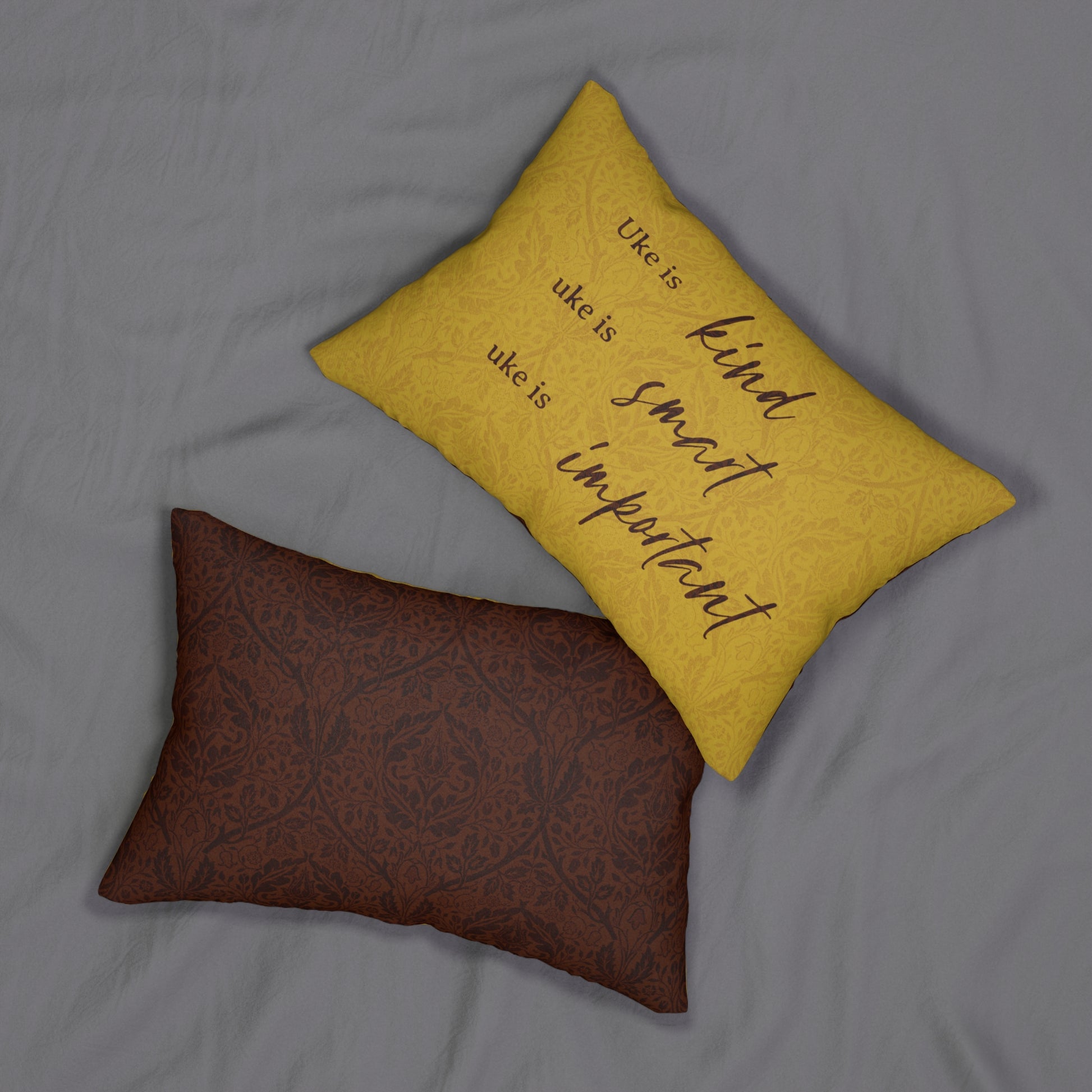 The front and back of the pillow, showing the text graphic on the front only.