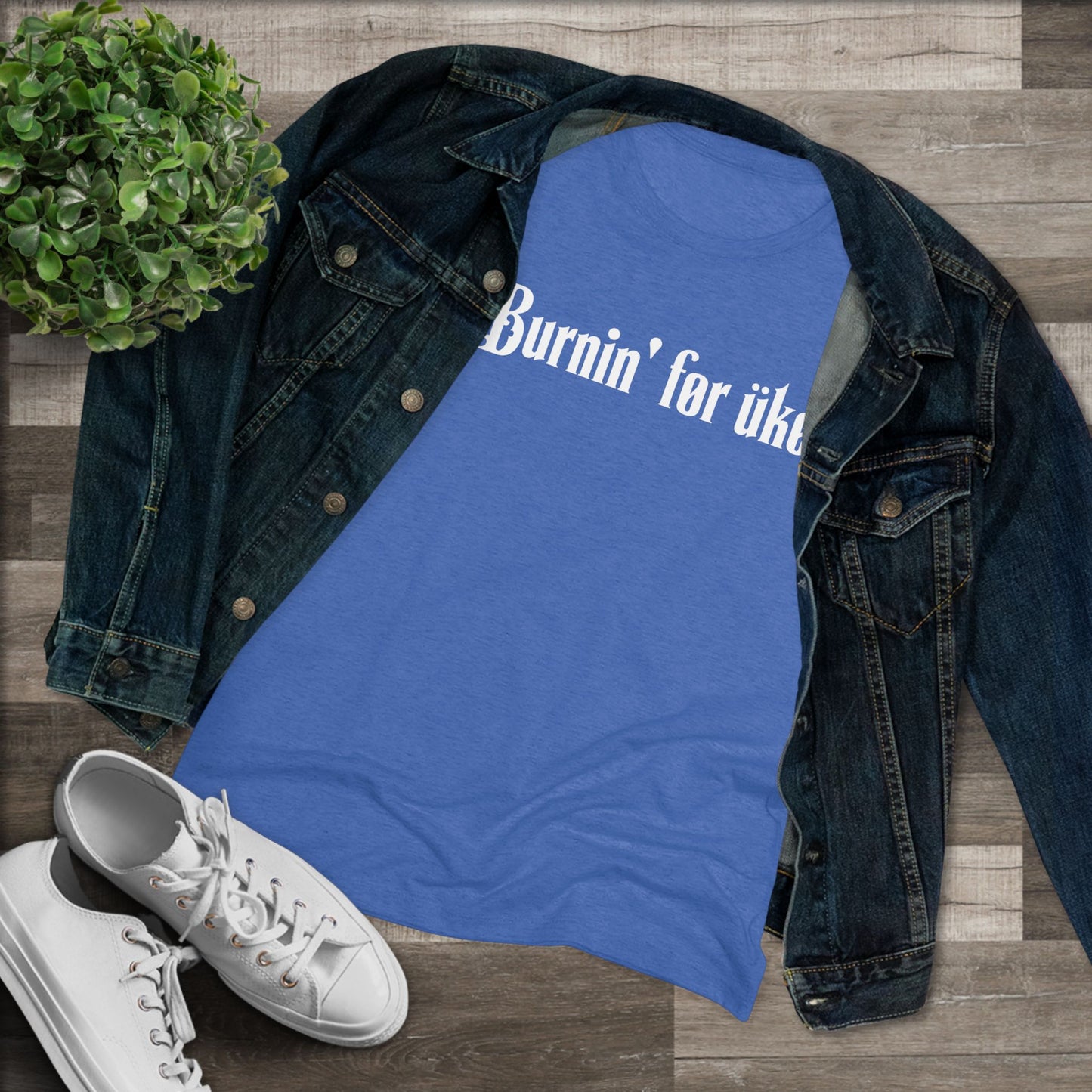 Royal Blue t-shirt with 'Burnin' for uke' in white Gothic letters printed on it, styled with a denim jacket and white sneakers.