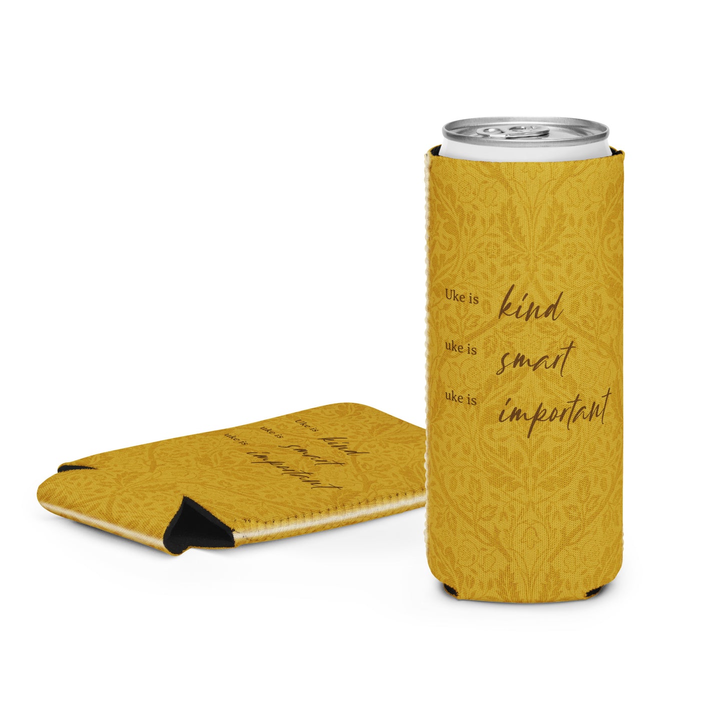 Slim can coozie with a mustard-colored, patterned background and 'Uke is kind, uke is smart, uke is important' printed on it.