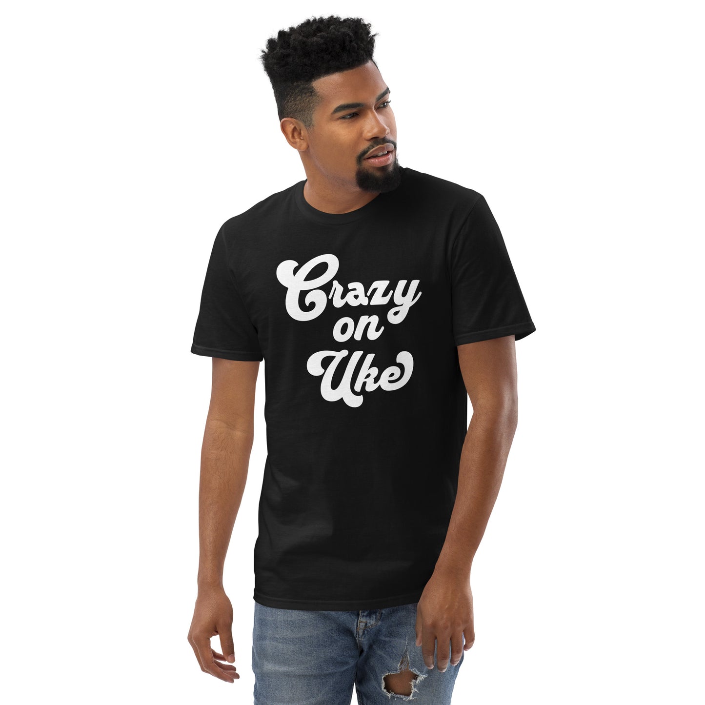 Man wearing a black t-shirt with 'Crazy On Uke' in white cursive text.