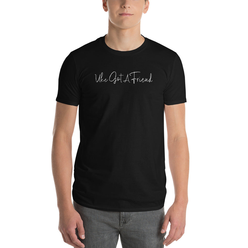 Man wearing a black t-shirt printed with 'Uke Got A Friend' in white cursive text.