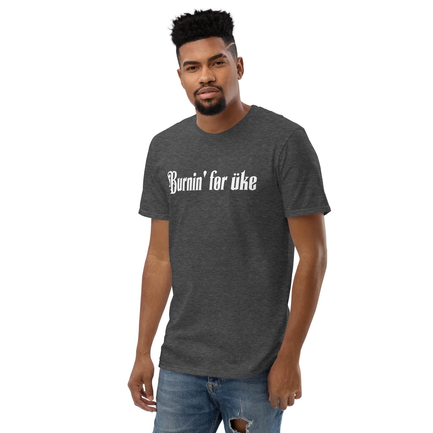 Man wearing a heathered dark grey t-shirt with 'Burnin' for uke' in white Gothic letters printed on it.
