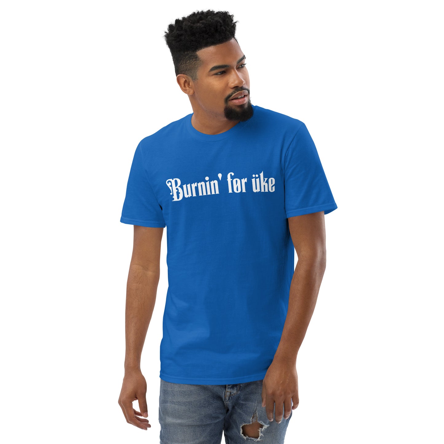 Man wearing a royal blue t-shirt with 'Burnin' for uke' in white Gothic letters printed on it.