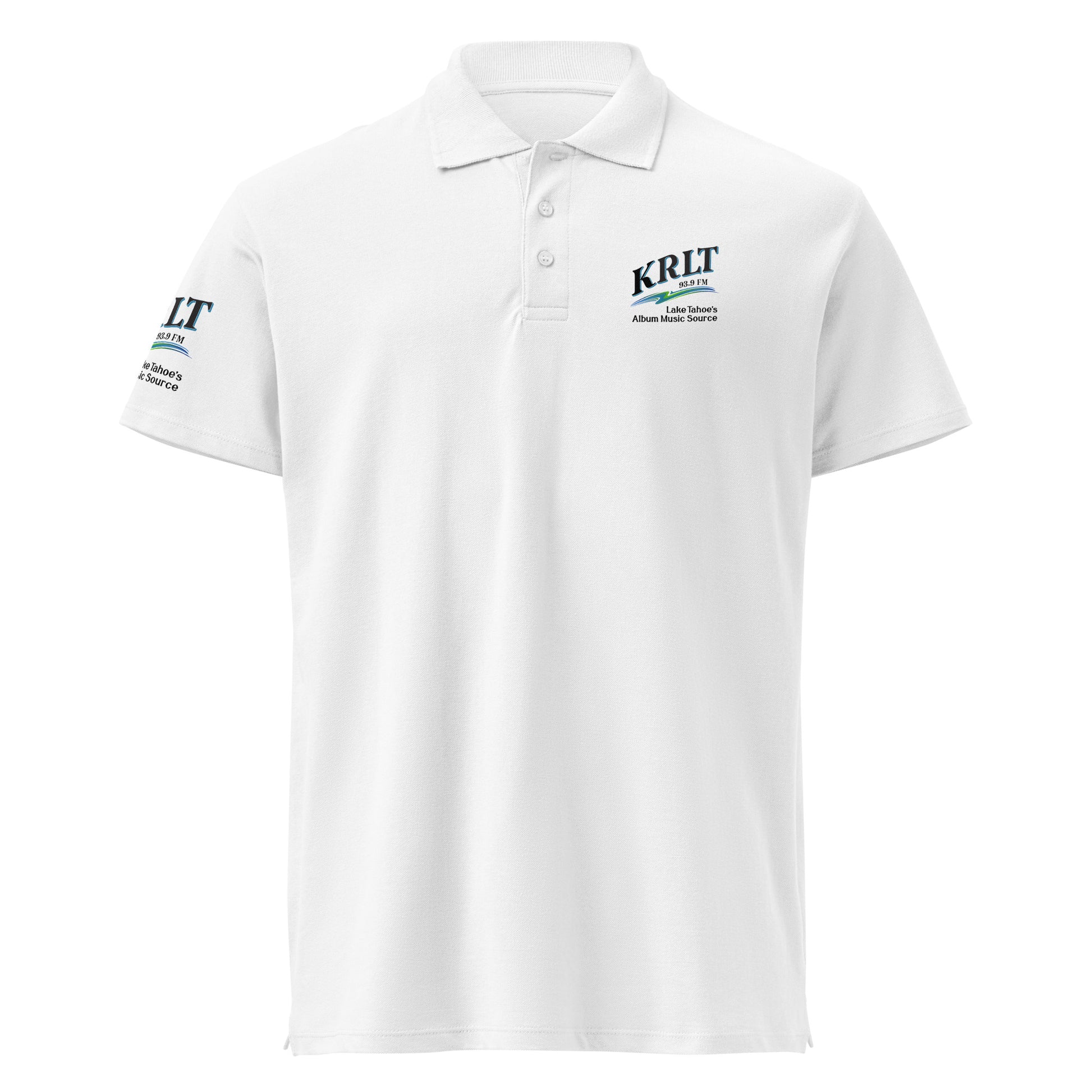 Front view of a white golf shirt with the KRLT logo in black, blue, and green, placed on the left upper-chest and right sleeve.