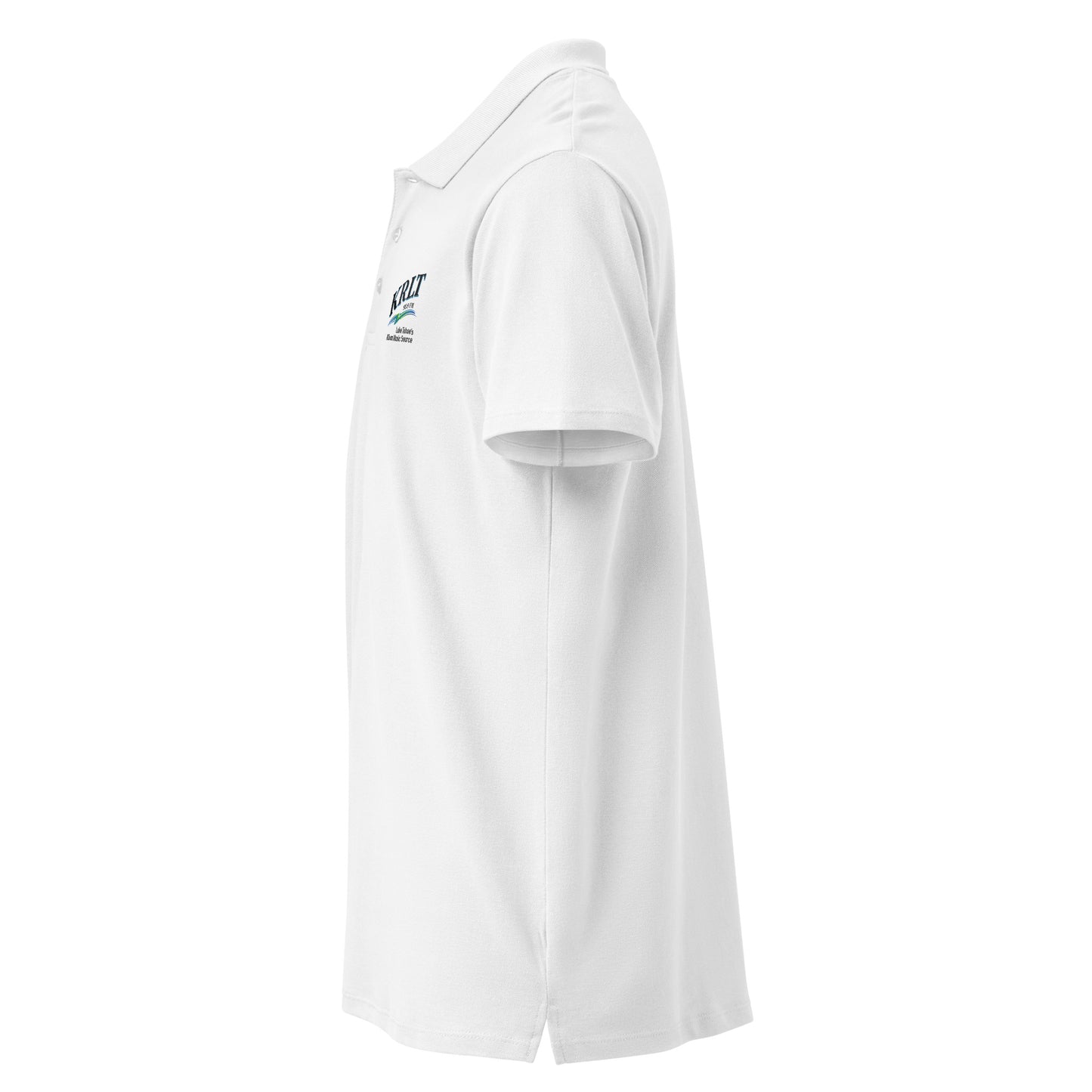 Side view of a white golf shirt with the KRLT logo in black, blue, and green, placed on the left upper-chest (right sleeve hidden from view).