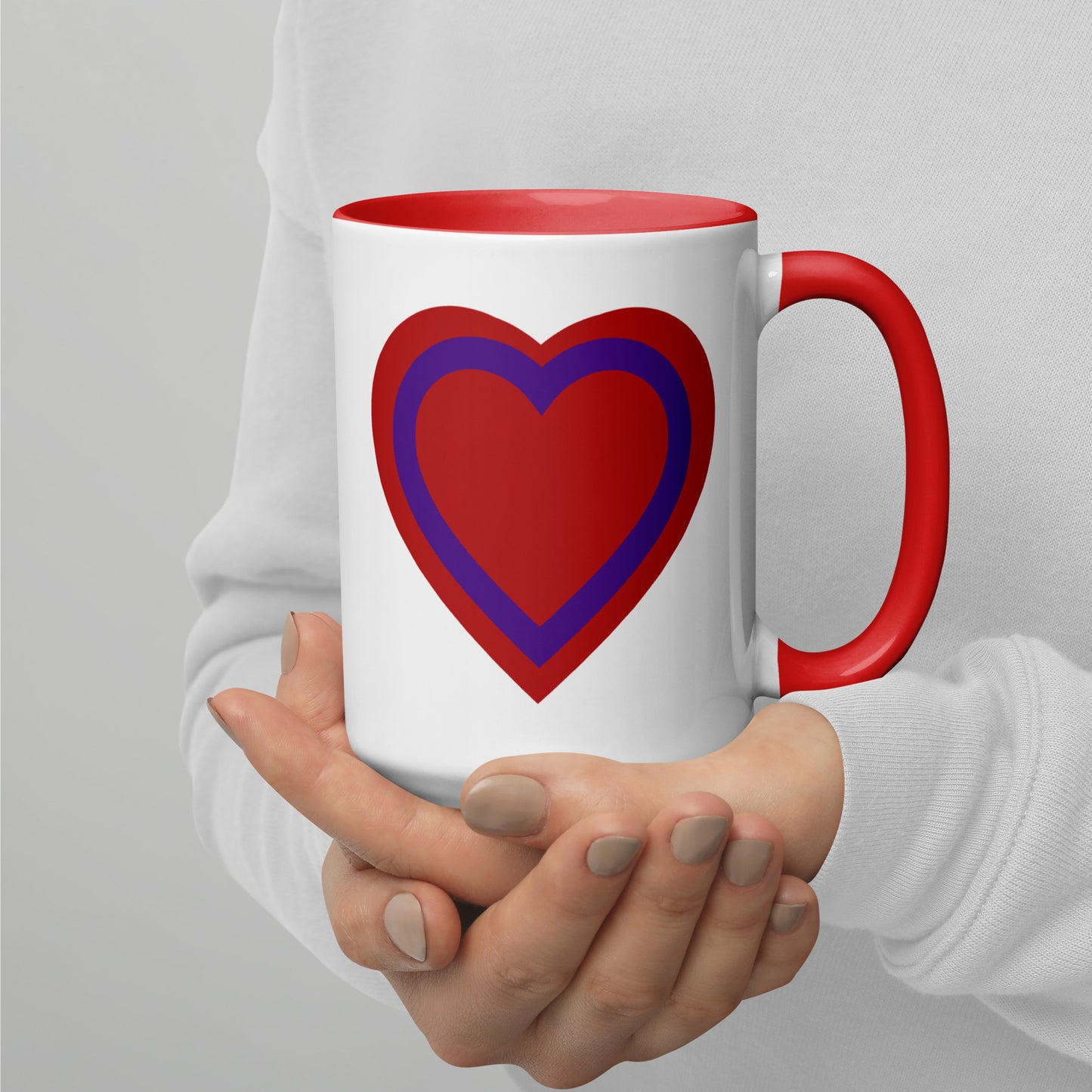 15-ounce white mug with red handle and inside, with a red and purple heart printed on the side to the left of the handle.