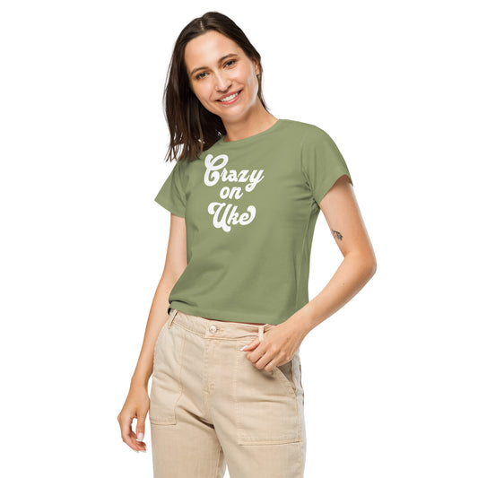 Woman wearing an artichoke-green high-waisted t-shirt with 'Crazy On Uke' in white cursive text.
