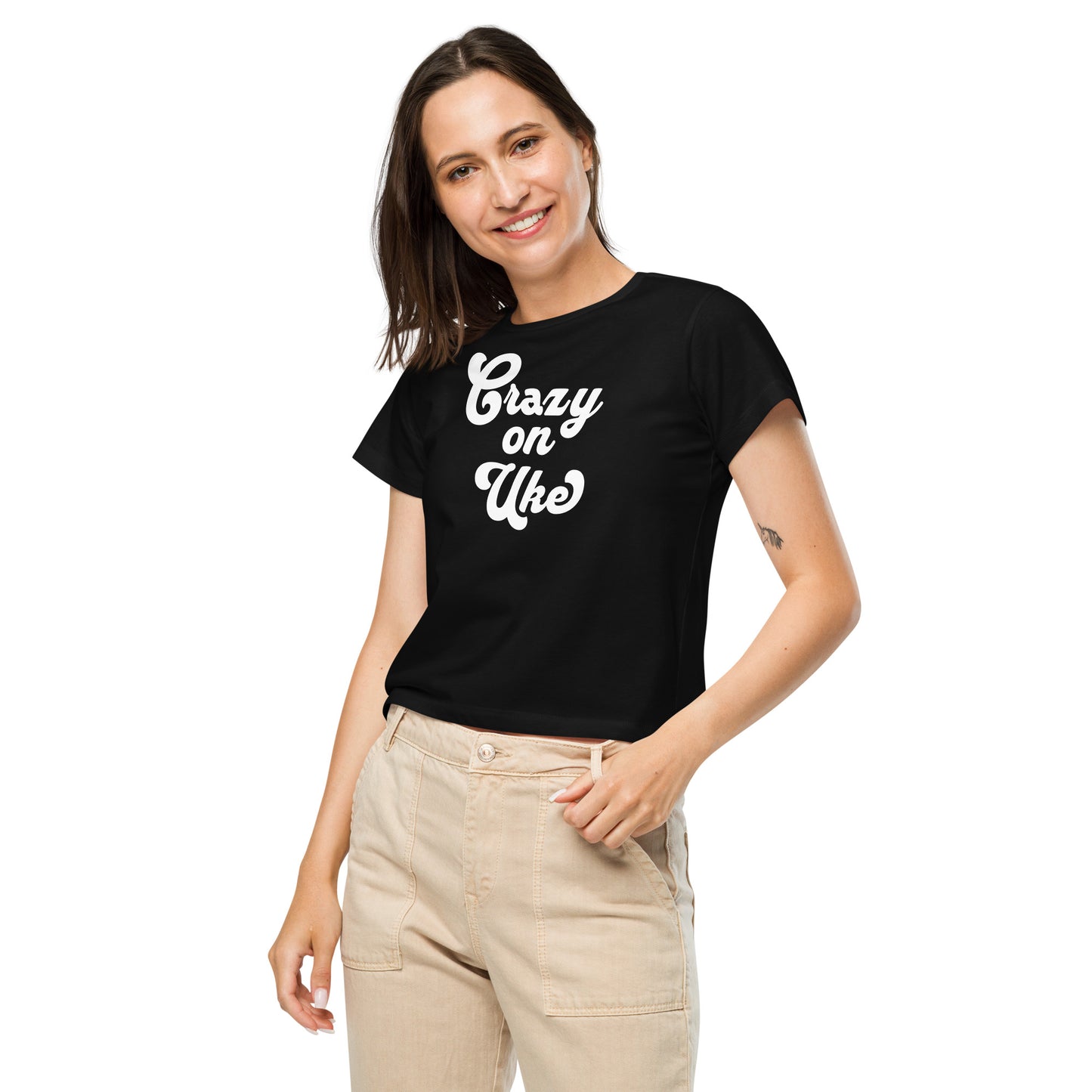 Woman wearing a black high-waisted t-shirt with 'Crazy On Uke' in white cursive text.