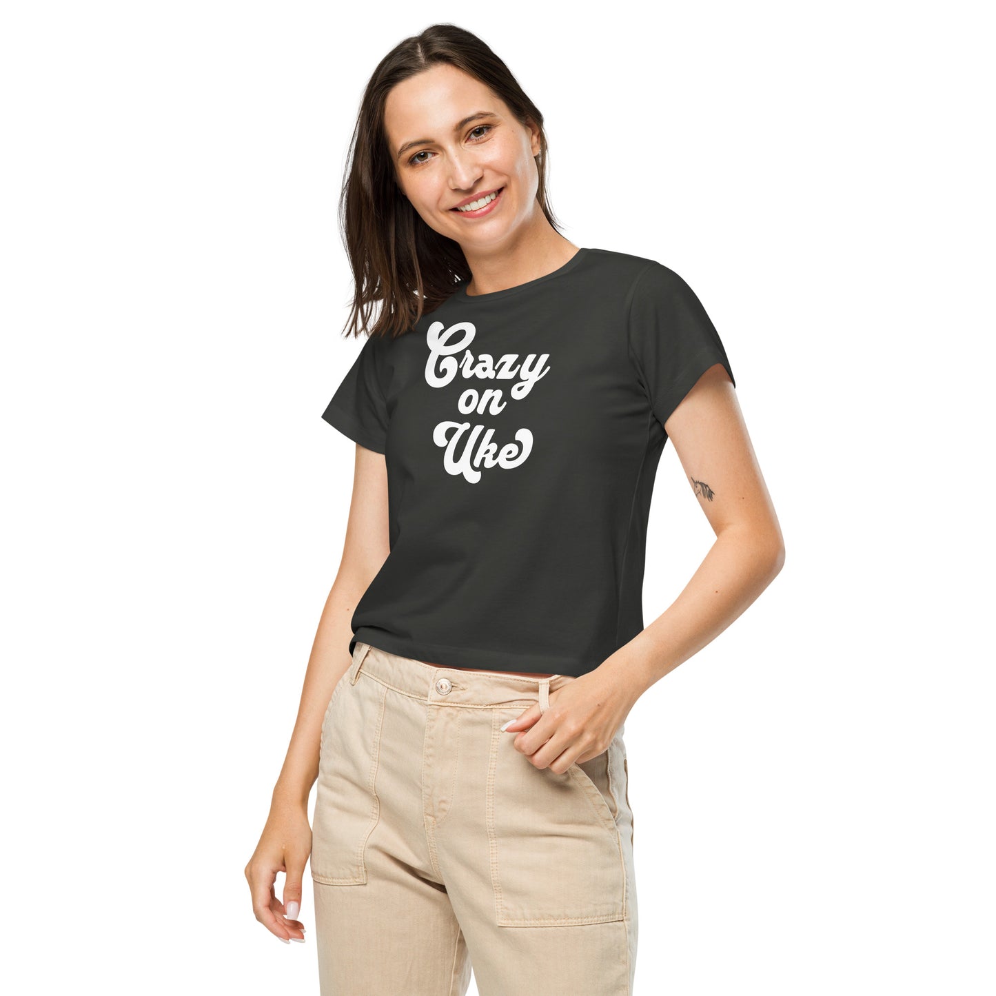 Woman wearing a vintage-black high-waisted t-shirt with 'Crazy On Uke' in white cursive text.
