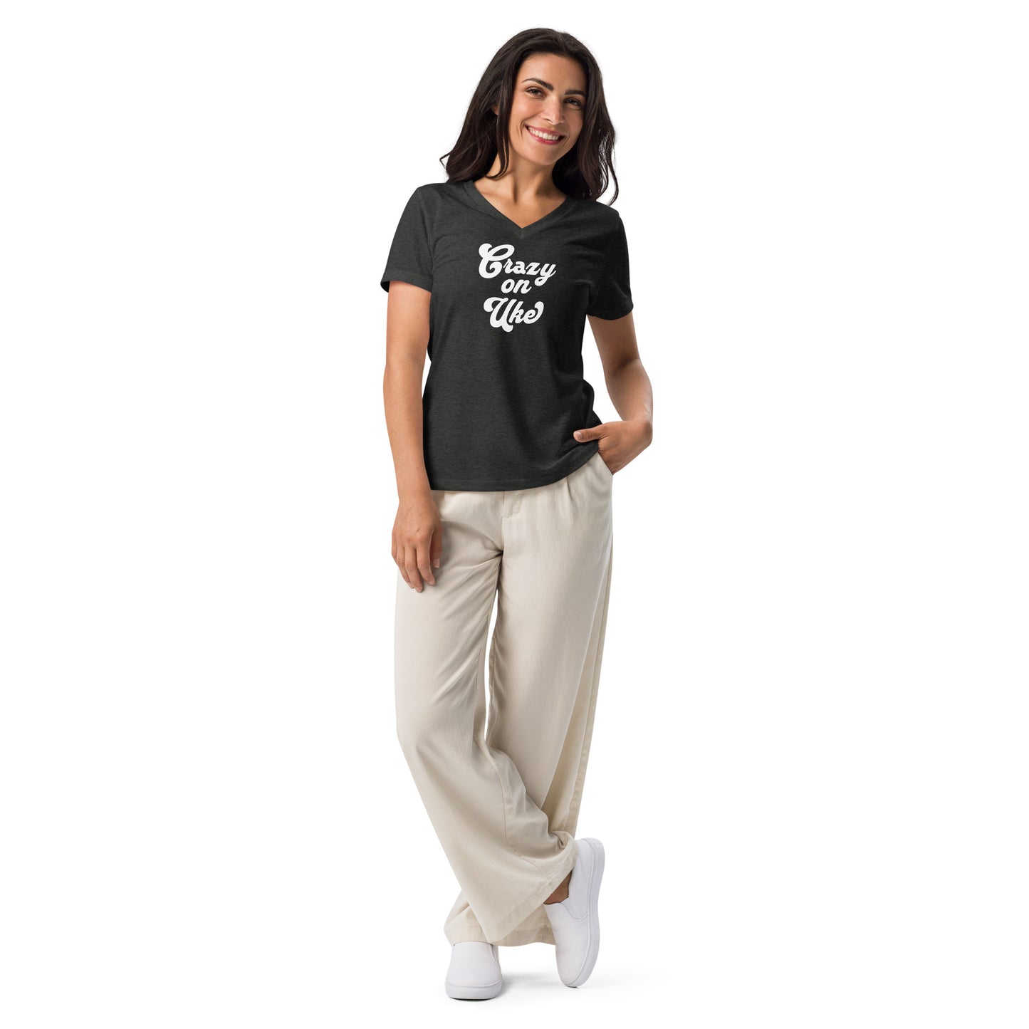 Woman wearing a dark grey v-neck t-shirt with 'Crazy On Uke' in white cursive text.