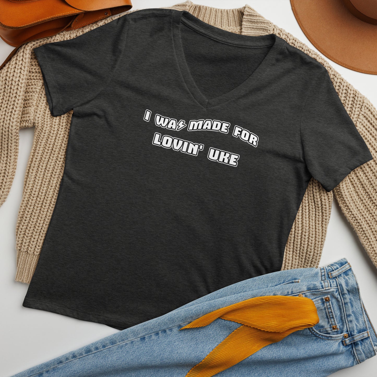Dark grey v-neck t-shirt printed with 'I was made for lovin' uke' in black and white block letters.