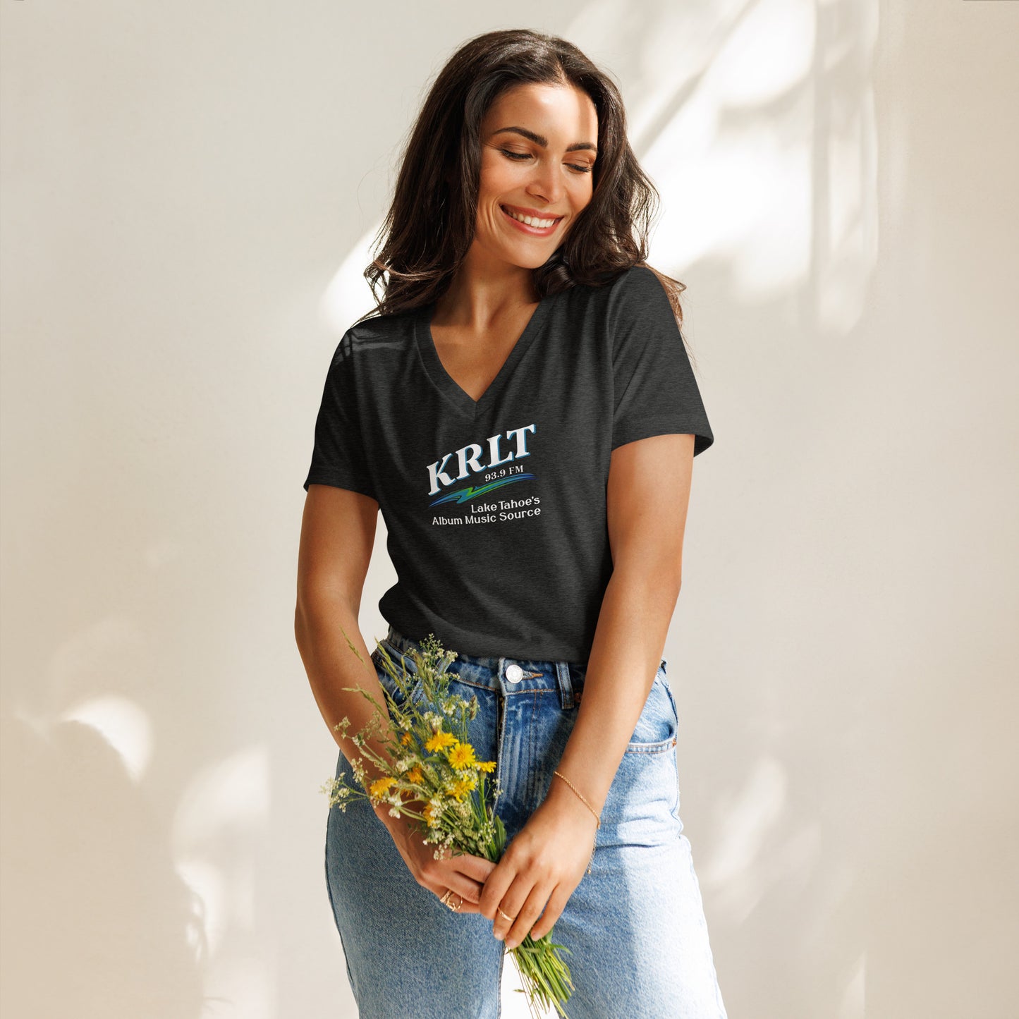 Women's Dark Grey Heather v-neck t-shirt with square, centered KRLT logo in white, blue, and green.