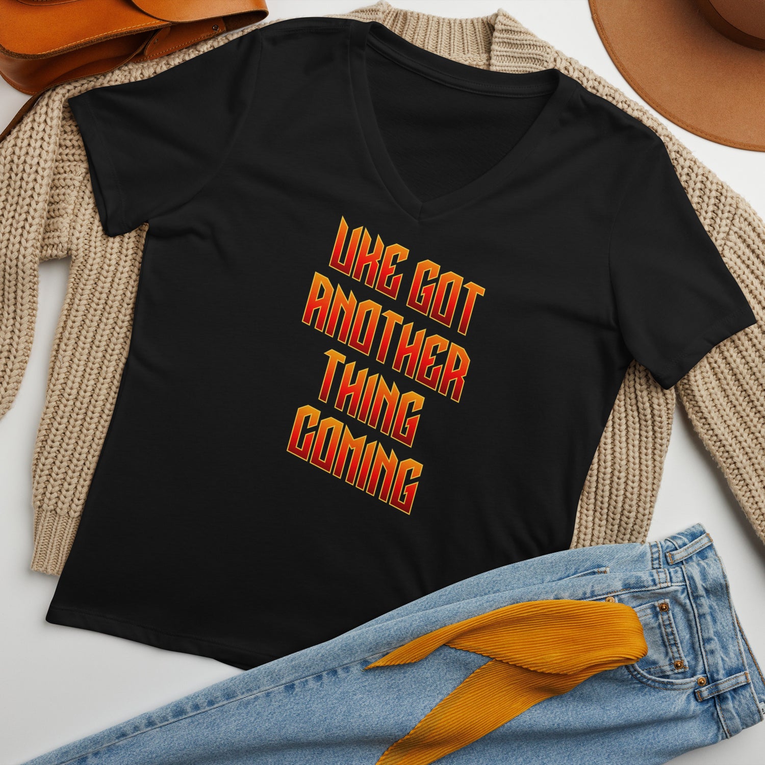 Black v-neck t-shirt printed with 'Uke Got Another Thing Coming' in orange and yellow slanted block letters.