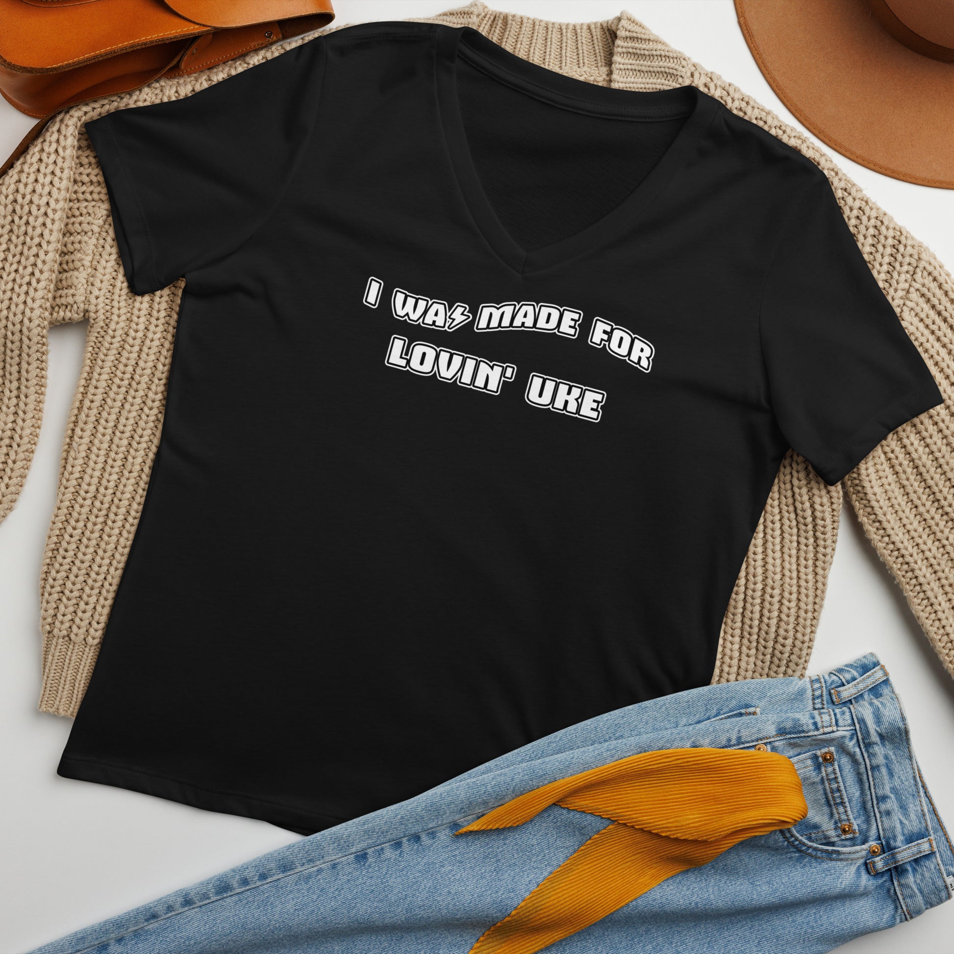 Black v-neck t-shirt printed with 'I was made for lovin' uke' in black and white block letters.