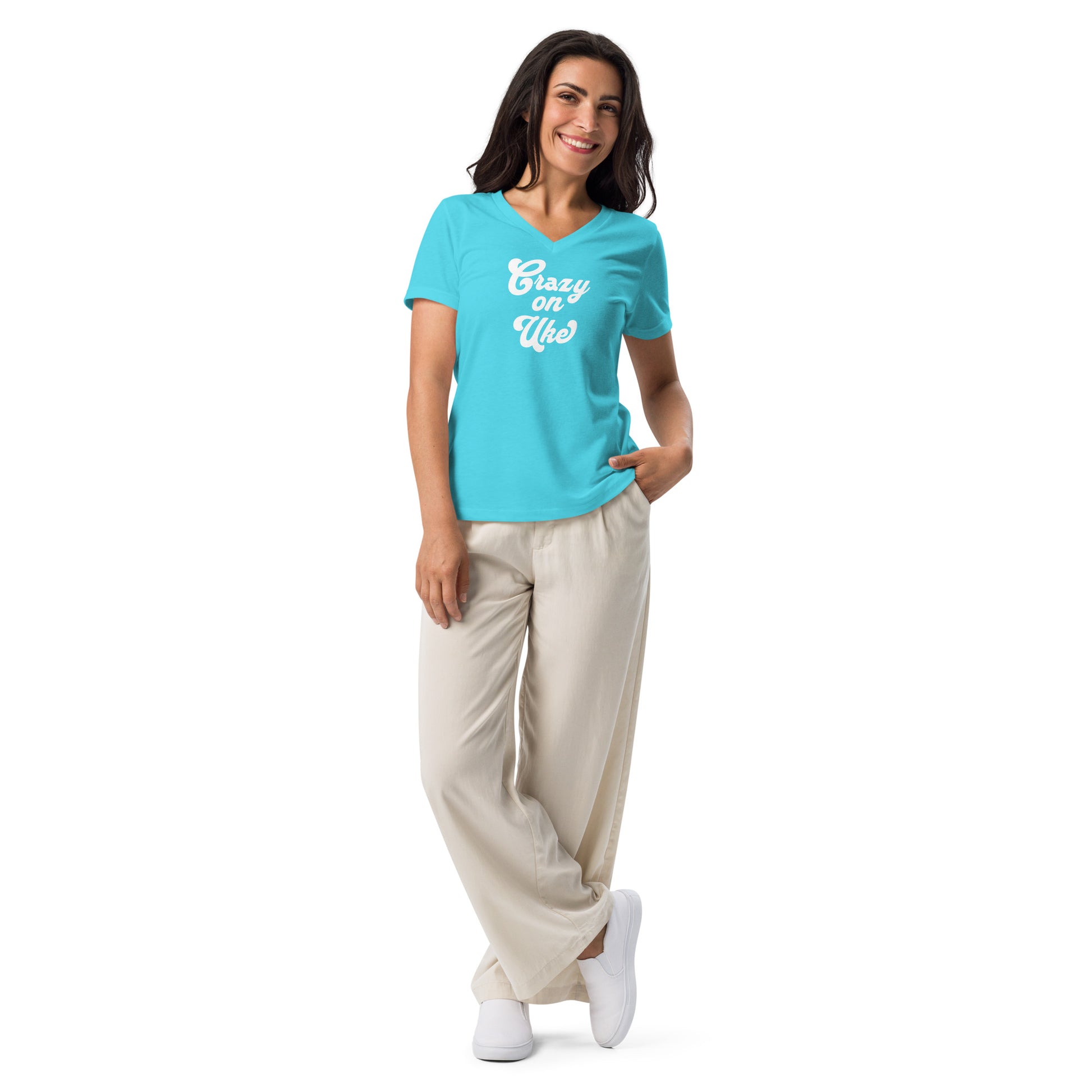 Woman wearing a turquoise v-neck t-shirt with 'Crazy On Uke' in white cursive text.
